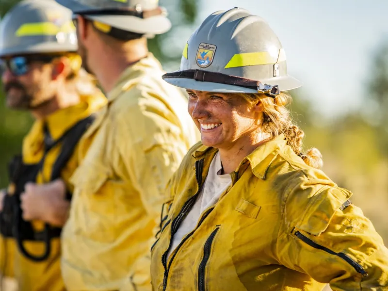 A firefighter smiles after a prescribed fire at Balcones Canyonlands National Wildlife Refuge in Texas.
