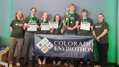 A group of high school students celebrates a win at the 2024 Colorado Envirothon competition